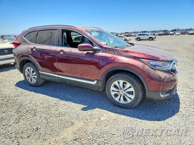 Czwarte zdjęcie samochodu z boku: 2018 HONDA CR-V TOURING VIN:2HKRW2H95JH610100 - miniatura