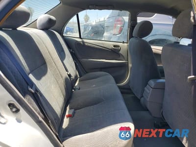 Zdjęcie 10 z 12 samochodu: 2002 TOYOTA COROLLA LE VIN:1NXBR12E52Z584769 - miniatura