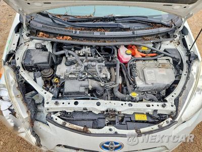 Zdjęcie 11 z 12 samochodu: 2012 TOYOTA PRIUS C THREE VIN:JTDKDTB32C1509477 - miniatura
