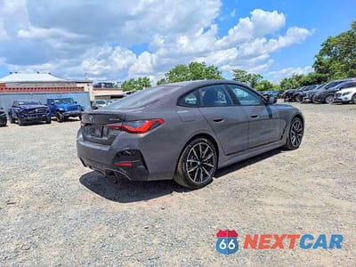 Czwarte zdjęcie samochodu z boku: 2026 BMW I4 XDRIVE 40 VIN:WBY43HD06TFW38609 - miniatura
