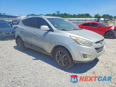 Czwarte zdjęcie samochodu z boku: 2014 HYUNDAI TUCSON SE VIN:KM8JU3AG0EU933902 - miniatura