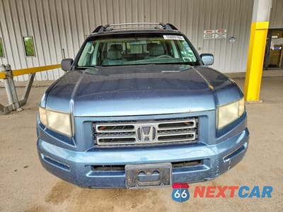 Piąte zdjęcie samochodu w środku: 2006 HONDA RIDGELINE RTS VIN:2HJYK16456H520756 - miniatura