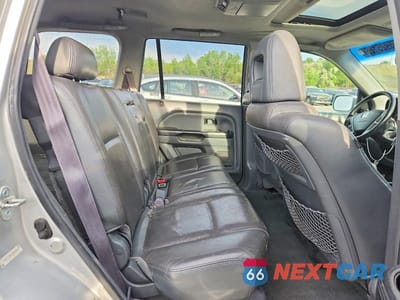 Zdjęcie 11 z 13 samochodu: 2005 HONDA PILOT EXL VIN:2HKYF18695H508266 - miniatura