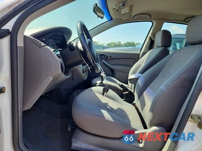 Zdjęcie 7 z 12 samochodu: 2003 FORD FOCUS ZX5 VIN:3FAHP37323R133658 - miniatura