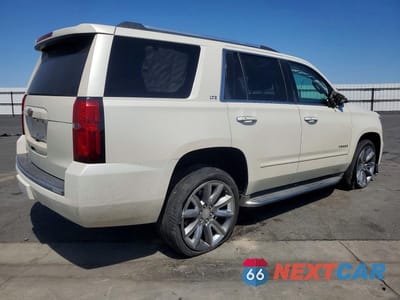 Trzecie zdjęcie samochodu z tyłu: 2015 CHEVROLET TAHOE C1500 LTZ VIN:1GNSCCKC3FR159227 - miniatura