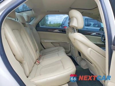 Zdjęcie 10 z 12 samochodu: 2013 LINCOLN MKZ VIN:3LN6L2JK4DR810441 - miniatura