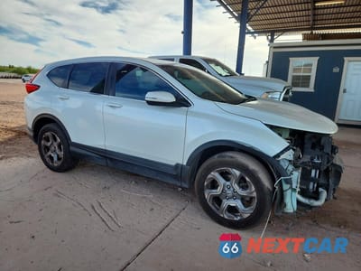 Czwarte zdjęcie samochodu z boku: 2018 HONDA CR-V EXL VIN:2HKRW2H83JH611270 - miniatura