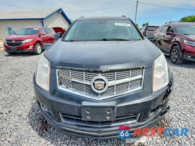 Piąte zdjęcie samochodu w środku: 2010 CADILLAC SRX PREMIUM COLLECTION VIN:3GYFNFEY1AS535601 - miniatura