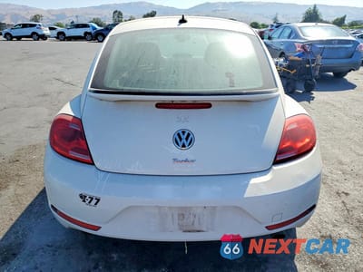 Zdjęcie 6 z 12 samochodu: 2014 VOLKSWAGEN BEETLE TURBO VIN:3VWVS7AT7EM600789 - miniatura