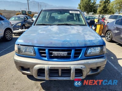 Piąte zdjęcie samochodu w środku: 2002 ISUZU RODEO SPORT VIN:4S2CK57D224309028 - miniatura
