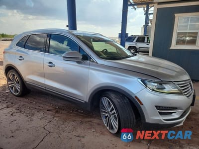 Czwarte zdjęcie samochodu z boku: 2016 LINCOLN MKC RESERVE VIN:5LMTJ3DH0GUJ15074 - miniatura