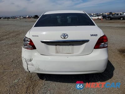Zdjęcie 6 z 12 samochodu: 2009 TOYOTA YARIS BASE VIN:JTDBT903X91321095 - miniatura