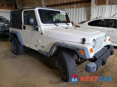 Czwarte zdjęcie samochodu z boku: 2004 JEEP WRANGLER VIN:1J4FA29104P787120 - miniatura