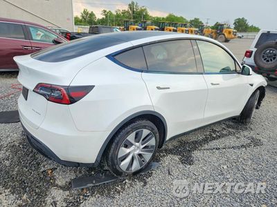 Trzecie zdjęcie samochodu z tyłu: 2023 TESLA MODEL Y VIN:7SAYGDEE7PA058757 - miniatura