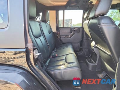 Zdjęcie 10 z 12 samochodu: 2014 JEEP WRANGLER UNLIMITED SAHARA VIN:1C4BJWEG9EL118388 - miniatura