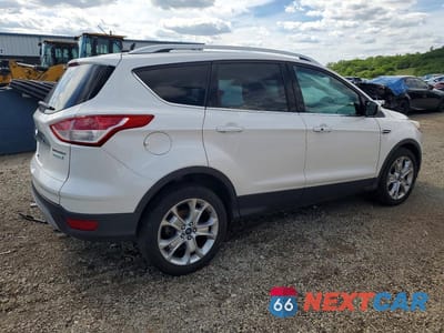 Trzecie zdjęcie samochodu z tyłu: 2014 FORD ESCAPE TITANIUM VIN:1FMCU0J95EUA99571 - miniatura