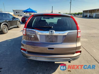 Zdjęcie 6 z 12 samochodu: 2015 HONDA CR-V LX VIN:3CZRM3H32FG709779 - miniatura