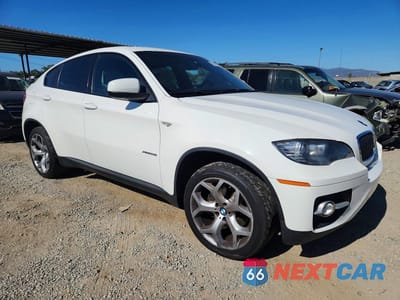 Czwarte zdjęcie samochodu z boku: 2012 BMW X6 XDRIVE35I VIN:5UXFG2C54CLX09850 - miniatura