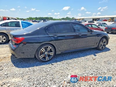 Trzecie zdjęcie samochodu z tyłu: 2019 BMW 740 I VIN:WBA7E2C52KB217704 - miniatura