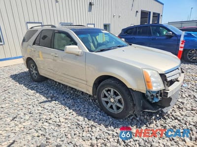 Czwarte zdjęcie samochodu z boku: 2008 CADILLAC SRX VIN:1GYEE437680215007 - miniatura