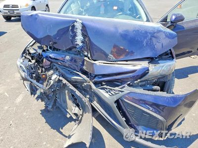 Zdjęcie 11 z 12 samochodu: 2022 TOYOTA CAMRY SE VIN:4T1G11AK3NU050551 - miniatura