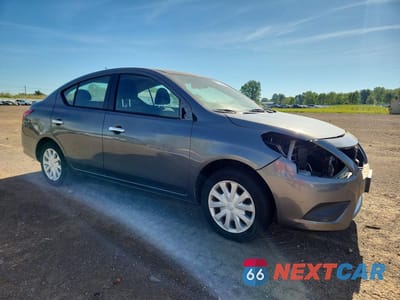 Czwarte zdjęcie samochodu z boku: 2017 NISSAN VERSA 1.6 SV VIN:3N1CN7AP3HL860978 - miniatura