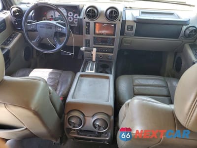 Zdjęcie 8 z 13 samochodu: 2003 HUMMER H2 VIN:5GRGN23U03H120685 - miniatura