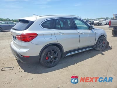 Trzecie zdjęcie samochodu z tyłu: 2018 BMW X1 XDRIVE28I VIN:WBXHT3C36J5K22051 - miniatura