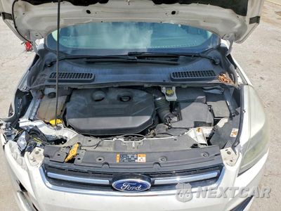 Zdjęcie 12 z 13 samochodu: 2016 FORD ESCAPE TITANIUM VIN:1FMCU9J94GUA92442 - miniatura