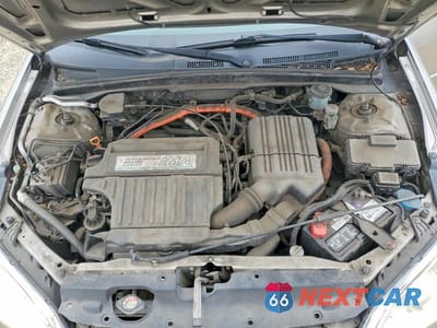 Zdjęcie 11 z 13 samochodu: 2004 HONDA CIVIC HYBRID VIN:JHMES956X4S016569 - miniatura