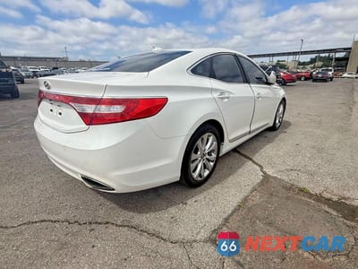 Czwarte zdjęcie samochodu z boku: 2013 HYUNDAI AZERA BASE VIN:KMHFG4JG8DA312524 - miniatura