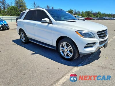 Czwarte zdjęcie samochodu z boku: 2015 MERCEDES-BENZ ML 350 4MATIC VIN:4JGDA5HB7FA586423 - miniatura