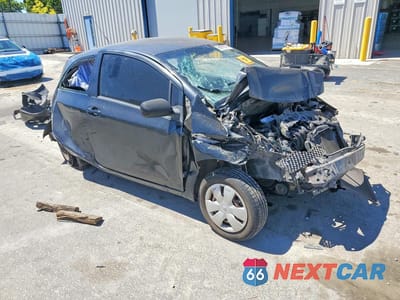 Czwarte zdjęcie samochodu z boku: 2007 TOYOTA YARIS BASE VIN:JTDJT923375134327 - miniatura