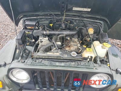 Zdjęcie 12 z 13 samochodu: 1998 JEEP WRANGLER / TJ SPORT VIN:1J4FY19S9WP786680 - miniatura
