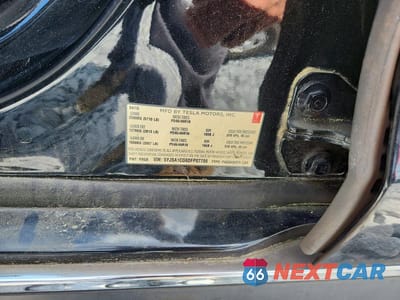 Zdjęcie 12 z 12 samochodu: 2013 TESLA MODEL S VIN:5YJSA1CG9DFP07786 - miniatura