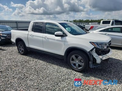 Czwarte zdjęcie samochodu z boku: 2022 HONDA RIDGELINE RTL VIN:5FPYK3F50NB025918 - miniatura