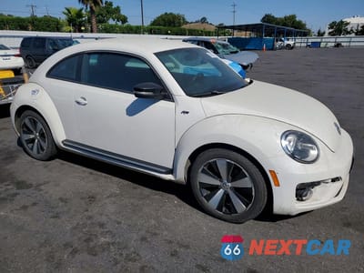 Czwarte zdjęcie samochodu z boku: 2014 VOLKSWAGEN BEETLE TURBO VIN:3VWVS7AT7EM600789 - miniatura