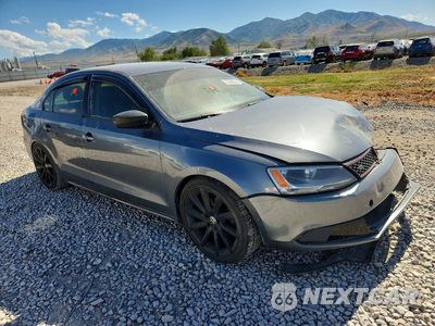 Czwarte zdjęcie samochodu z boku: 2014 VOLKSWAGEN JETTA BASE VIN:3VW1K7AJ4EM438035 - miniatura