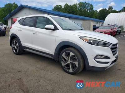 Czwarte zdjęcie samochodu z boku: 2017 HYUNDAI TUCSON SPORT VIN:KM8J33A21HU271100 - miniatura