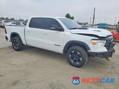 Czwarte zdjęcie samochodu z boku: 2020 RAM 1500 REBEL VIN:1C6SRFLT5LN215928 - miniatura