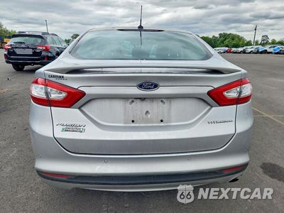 Zdjęcie 6 z 12 samochodu: 2015 FORD FUSION TITANIUM PHEV VIN:3FA6P0SU6FR253604 - miniatura