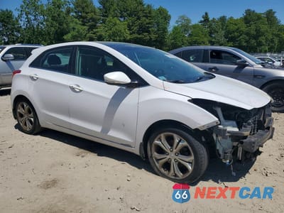 Czwarte zdjęcie samochodu z boku: 2013 HYUNDAI ELANTRA GT BASE VIN:KMHD35LE2DU103749 - miniatura