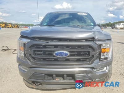 Piąte zdjęcie samochodu w środku: 2022 FORD F150 SUPERCREW VIN:1FTFW1E89NFB24317 - miniatura