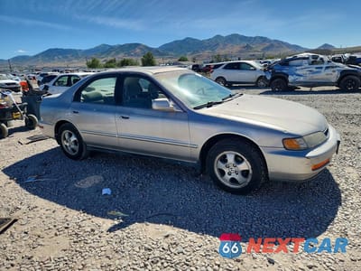 Czwarte zdjęcie samochodu z boku: 1997 HONDA ACCORD SE VIN:1HGCD5602VA159708 - miniatura