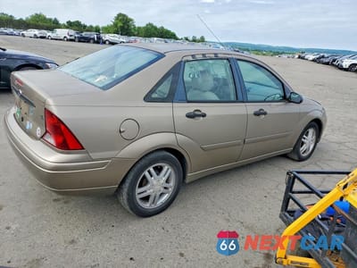 Trzecie zdjęcie samochodu z tyłu: 2003 FORD FOCUS SE COMFORT VIN:1FAHP34393W206509 - miniatura