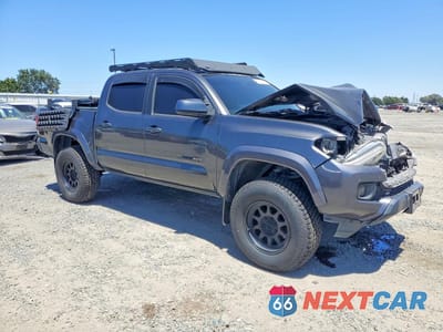 Czwarte zdjęcie samochodu z boku: 2018 TOYOTA TACOMA SR5 V6 VIN:3TMAZ5CN8JM053574 - miniatura