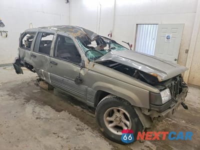 Czwarte zdjęcie samochodu z boku: 1997 JEEP GRAND CHEROKEE LAREDO/TSI VIN:1J4GZ58Y9VC757491 - miniatura