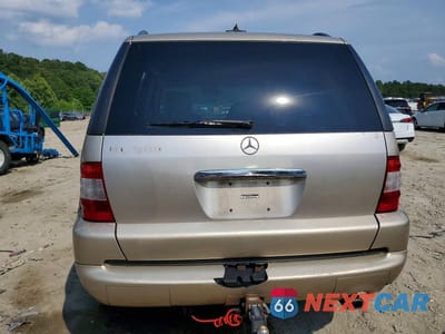 Zdjęcie 6 z 13 samochodu: 2002 MERCEDES-BENZ ML 500 VIN:4JGAB75E42A359081 - miniatura