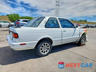 Trzecie zdjęcie samochodu z tyłu: 1992 NISSAN SENTRA VIN:1N4EB32A6NC737559 - miniatura