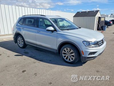 Czwarte zdjęcie samochodu z boku: 2018 VOLKSWAGEN TIGUAN VIN:3VV2B7AX3JM106742 - miniatura